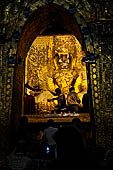 Myanmar's most famous Buddha image, 13ft high and covered in 6 inches of pure gold leaf, Mahamuni Paya, Mandalay, Myanmar  